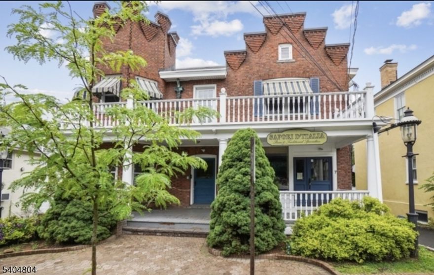 Sun-filled office space in a prime in-town Mendham location. Situated on the first floor of the iconic Castle Building, this inviting and character-rich unit offers both functionality and charm. A welcoming front porch creates an ideal entry for clients, while French doors open into the main office area featuring built-in cabinetry, desk workspace, and file storage. The thoughtfully designed layout includes a generous seating or reception area, two separate private offices, and a convenient powder room. A rear door provides access to the back of the building and the parking lot, allowing for easy entry and exit. This light and bright space is highlighted by high ceilings, oversized windows, classic moldings, and timeless character throughout. Ample private parking is available in the rear, along with on-street parking in front. Just steps from shops, salons, cafes, and the Black Horse Inn, this distinctive office offers an exceptional in-town Mendham setting. Mintues to Morristown, Chester, Bernardsville, Basking Ridge and Peapack.