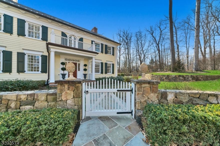 When today's lifestyle is blended with yesterday's staunch attention to quality and detail you have a perfect blend. 15 Hartley Farms combines everything that decerning buyers are looking for. Nestled on 3.5 acres in Hartley Farms, a mere 24 miles from New York City, this home is situated in a park-like setting with meticulously preserved landscaping and near walking paths. This spacious 9,000+ sq ft custom-built home boasts details throughout each inch.  Each level of this glorious home has high ceilings and extensive molding. Both living and dining rooms are exquisite and have fireplaces. A private office is paneled from floor to ceiling with bookcases and pocket doors. The designer kitchen is a chef's dream come true with an incredible center island, high-end appliances, dining area, and a large pantry. All of this opens to the incredible family room with custom built-ins, detailed millwork, transom windows & 2 sets of French doors leading to the beautiful bluestone patio. An outdoor kitchen is perfectly situated as a backdrop for endless entertaining options. 2 half baths, a custom mudroom, and a second office round out this main level. The lower level, with 10' ceilings, has a craft room, a wine/cigar room, a fitness room and a family/media room with a fireplace.The second floor is home to a stately primary suite with a fireplace, a sitting room,2 walk-in closets and a beautiful bathroom. 4 generously-sized, en-suite bedrooms with custom closets round out this spacious