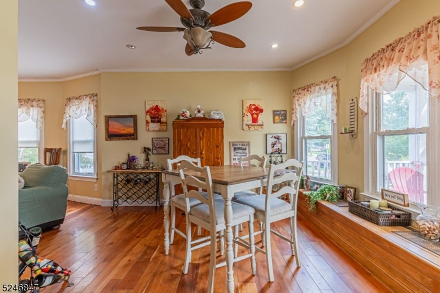 Welcome to this timeless Colonial-style home that seamlessly blends classic elegance with modern comforts, creating a haven of tranquility in a picturesque setting. This charming residence offers 6 rooms, including 3 bedrooms, 1 full bath, and 1 half bath, providing the perfect balance of space and functionality. In addition to the beautiful interior, the partially finished basement, walk-up attic, and an inviting rear yard with a deck and paver patio make this property truly exceptional.