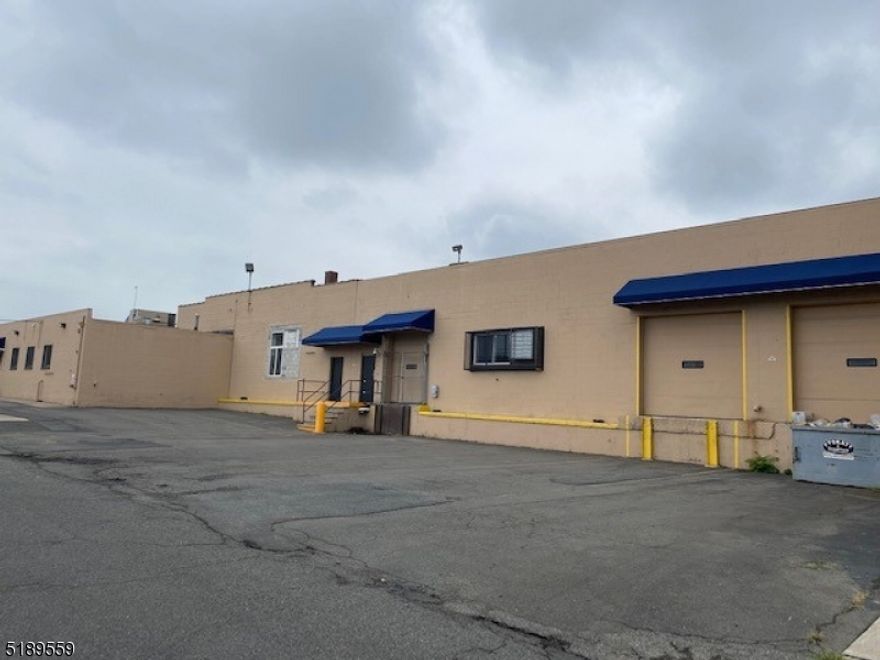 TOP GRADE INDUSTRIAL BUILDING AVAILABLE IMMEDIATLEY. APRX 14,431 SQ FT BUILDING W/ 1,000 SQ FT OFFICE SPACE. BUILDING SITS ON APRX 19,350 SQ FT LAND WITH SOME PARKING AVAILABLE. 12-15 CEILING HEIGHT. 3 LOADING DOCKS.  800 AMP POWER. MUNICIPAL WATER AND SEWER. GAS & ELECTRIC. ZONED INDUSTRIAL. SEE ATTACHED MEDIA FOR PLANS.