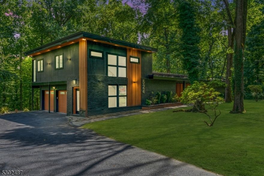 Experience unparalleled luxury in this breathtaking Mid-Century Modern masterpiece, now available for the discerning buyer. Inspired by the iconic Frank Lloyd Wright, this residence perfectly marries timeless elegance with cutting-edge sophistication. With a lavish 6,000 square feet of living space, this home offers 6 exquisite bedrooms and 4 opulent bathrooms, providing the ultimate in comfort and style. The ground floor boasts 2,200 square feet of seamless living, while the first floor expands to 2,600 square feet of pure indulgence. An additional 1,200 square feet on the third floor adds to the grandeur.Revel in the beauty of natural hickory floors throughout and enjoy year-round comfort with a state-of-the-art 3-zone HVAC system.This home is a fantastic option for a mother-daughter setup, featuring two primary bedrooms on each end for maximum privacy. The private lower level includes two additional bedrooms and space for a kitchenette, perfect for guests.Situated on 1.5 acres of prime real estate in the prestigious enclave of Watchung, NJ, this stunning home offers breathtaking views and an unparalleled lifestyle. Perfectly located just 40 minutes from NYC and 15 minutes from Newark Airport, this is your sanctuary of luxury and sophistication. The property includes a one year home warranty for peace of mind.