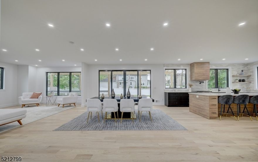 Welcome to this stunning new construction 5-bedroom, 5.5-bathroom modern farm house! With an open concept design, this home is perfect for those who love to entertain and appreciate the beauty of simplicity. As you step through the front door, you'll be greeted by a 2-story foyer that leads expansive open concept living room, dining room & kitchen area with ample natural light. The chef's kitchen boasts designer stainless steel appliances, sleek quartz countertops, and a large island that's perfect for preparing meals & hosting gatherings. The living room features a cozy fireplace. The adjacent dining area offers a beautiful space for formal dinners or casual meals. The 2nd floor features 3 additional bedrooms each with their own bathroom, large laundry room PLUS the primary suite which is a true retreat, complete with a spa-like en suite bathroom, sitting area & 2 walk-in closets. The finished walk-out basement is a blank slate with a full bathroom, utility room plus a bonus room. Outdoors, you'll find a large stone porch in the front and even larger Trex deck in the back with a pergola spanning the width of the home. The property is situated on a generous lot, offering plenty of space for outdoor activities and gardening. This new construction modern farm house is the perfect blend of style and functionality, making it the ideal home for those who crave a contemporary lifestyle. Don't miss out on the opportunity to make it yours! Located down the street from Nishuane Park