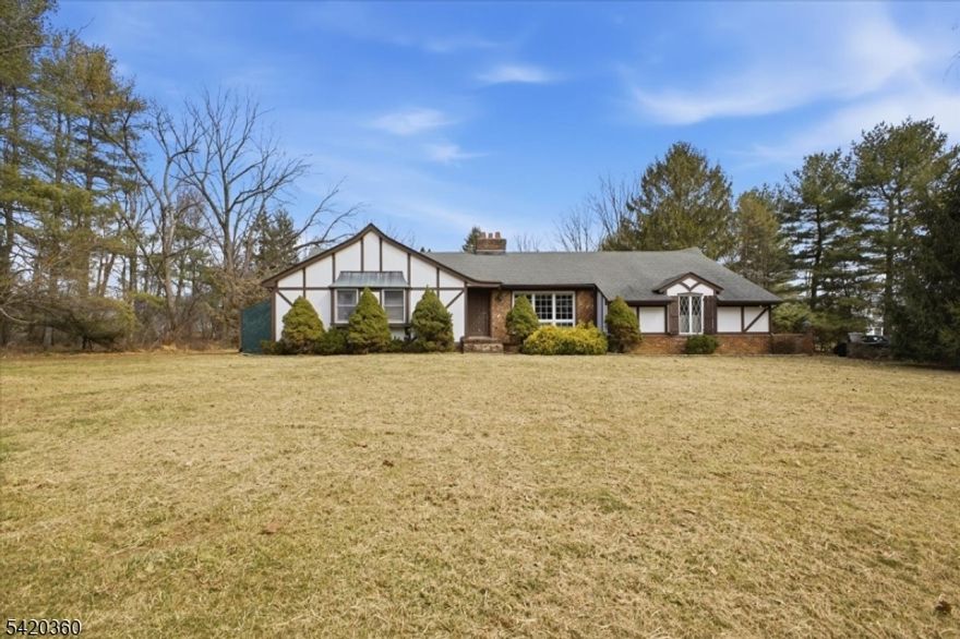 Set on more than 3 acres in highly sought-after Tewksbury Township, this ranch-style home offers the rare combination of single-floor living and a location surrounded by some of the area's most exquisite homes and picturesque horse farms. The setting provides both privacy and a scenic backdrop that's increasingly hard to find.The home features 3 bedrooms and 2.5 bathrooms, with a functional layout designed for comfortable everyday living. At the heart of the home, a striking two-sided brick fireplace serves as a focal point between the dining room and living room, adding warmth, character, and a natural gathering space for entertaining or relaxing.With expansive outdoor space, a desirable township location, and the ease of one-level living, this property presents a unique opportunity to enjoy the charm and tranquility that make Tewksbury so desirable.