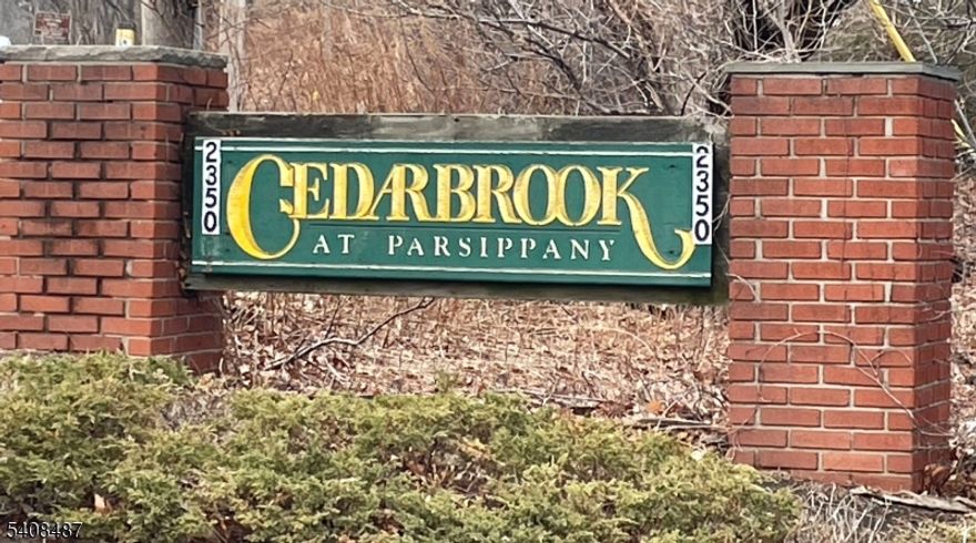 Own instead of paying rent!  Nicely appointed 2nd floor unit, spacious with updated kitchen, granite counters, newer S/S appliances and pantry. Refinished hardwood floors. Assn includes: assigned parking space, outdoor IG pool, tennis, playground and picnic areas as well as includes most of your utilities except electric and internet. Also includes snow removal. Laundry in Building basement (app). One assigned parking spot close proximity to unit with additional guest spaces available. No dogs allowed.  Huge balcony w/tiled flooring & storage. Window ACs included.  Newer hot water heater. Great location in complex, right near main stairs to building A. Easy commuting access to Routes 10, 53, 202, and 287, close to shopping, supermarkets, restaurants, & convenient NYC transportation. Please check with HOA on fees, rules and regulations.