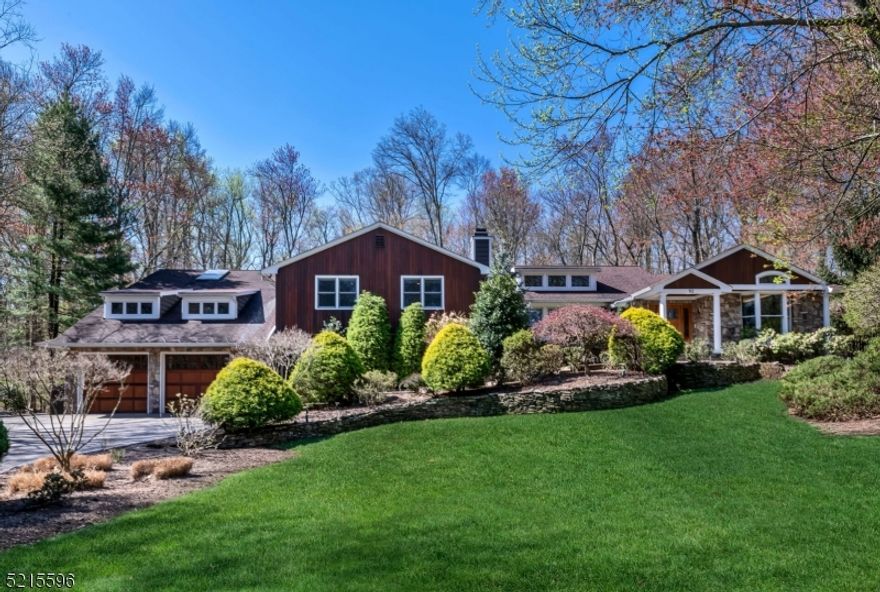 Discover The Home You've Been Dreaming Of - Nestled At The End Of The Block On One Of Allendale's Most Sought-After Streets. This Stunning Approx 6000 SF Col Split Boasts A Picturesque Park-Like Setting That Backs Up To The Woods. The First Floor Of The Home Is An Exceptionally Bright And Open Space With A Wonderful Flow. The Back Side Of The House Is Entirely Composed Of Windows, Offering An Abundance Of Natural Light To The Interior. On the second floor you will discover a stunning primary suite complete with a fireplace, two walk-in closets, and a luxurious custom en suite. Additionally, there is a junior suite, two more bedrooms, and a full bath. The Ground Level Will Impress You With A Gym Equipped W/Cedar Sauna & Steam Shower, A Spacious Office W/Wall Of Windows Overlooking The Yard, & A Finished Bsmnt W/Cedar Wine Room. You Will Love The 4-Car Heated Garage. Enjoy Watching The Town's Fireworks From Your Resort-Style Backyard W/Heated Gunite Pool W/Lighted Waterfall, Trex Deck, Built-In Kit, A Fire Pit Beach Area, Lighted Half Basketball Court & Outdoor Lighting & Sonos Speakers Throughout The Yard. Walking Distance To Top-Rated Schools & Crestwood Lake. Easy NYC Commute Via Train Or Bus.