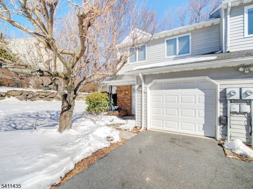 Rare opportunity to own a sun-drenched END UNIT in the highly sought-after Powder Mill community! This spacious 3-bedroom, 2.5-bath townhome with a full basement offers exceptional living space, privacy, and an unbeatable location. Flooded with natural light from three exposures, the first floor features an expansive living room with a cozy wood-burning fireplace, perfect for relaxing or entertaining. The large eat-in kitchen offers ample space and sliders leading to a generous deck overlooking a serene, lushly wooded and private setting. A separate formal dining room and a bright, window-filled den/home office provide flexibility for today's lifestyle needs.Upstairs, the primary suite has two walk-in closets and an ensuite bath. Two additional well-sized bedrooms, a full hall bath, and abundant closet space complete the second level. The full, walkout basement offers endless possibilities for storage, recreation, or future finishing. This is an estate, As Is sale. Residents of Powder Mill enjoy outstanding community amenities including a pool, tennis courts, playground, and clubhouse. Conveniently located with easy access to Routes 10, 46, 80, and 287, commuting is effortless. Situated within the highly rated Parsippany school district with a desirable Morris Plains mailing address, and all with a very low HOA fee.This is a true gem   don't miss the opportunity to make it yours!