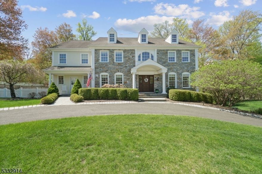 Discover timeless elegance and everyday comfort in this exquisite custom Colonial home, offering over 4,682 sq ft of refined space. From the grand two-story foyer with travertine marble floors to the formal living and banquet-sized dining rooms, every detail offers a perfect blend of luxury and timeless elegance.The gourmet chef's kitchen features top-tier appliances and radiant-heated floors, overlooking a beautiful family room with a wood-burning fireplace. Upstairs, five spacious bedrooms include a luxurious primary suite with dual walk-ins and a spa-like en-suite bath.Downstairs, the finished basement offers new carpeting, rec and fitness areas, a powder room and direct garage access. Set on .65 acres and located in a sought-after community with top schools and easy NYC access, this home blends upscale living with everyday comfort.