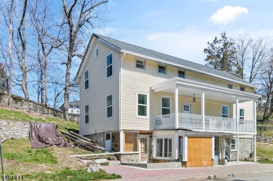 Apartment B is one of 2 side-by-side units in a completely renovated building on historic Main Street. Everything was new as of the 2021 construction... new insulation, walls, windows, hot water heater, lighting, combo heat pump-a/c built-in units in each upstairs BR and the downstairs LR: Easy-care laminate flooring, kitchen counters & cabinetry, microwave, electric stove-oven & refrigerator; a full bath with a tiled bath-shower upstairs with the 2 BRs and a half bath on  the first level. Drive only by choice. You're in walking distance of the elementary school, Footbridge Park, the Paulinskill Trail, Blair Academy and convenient restaurants & shopping on & just off historic Main Street.  Ground level in process of completion.