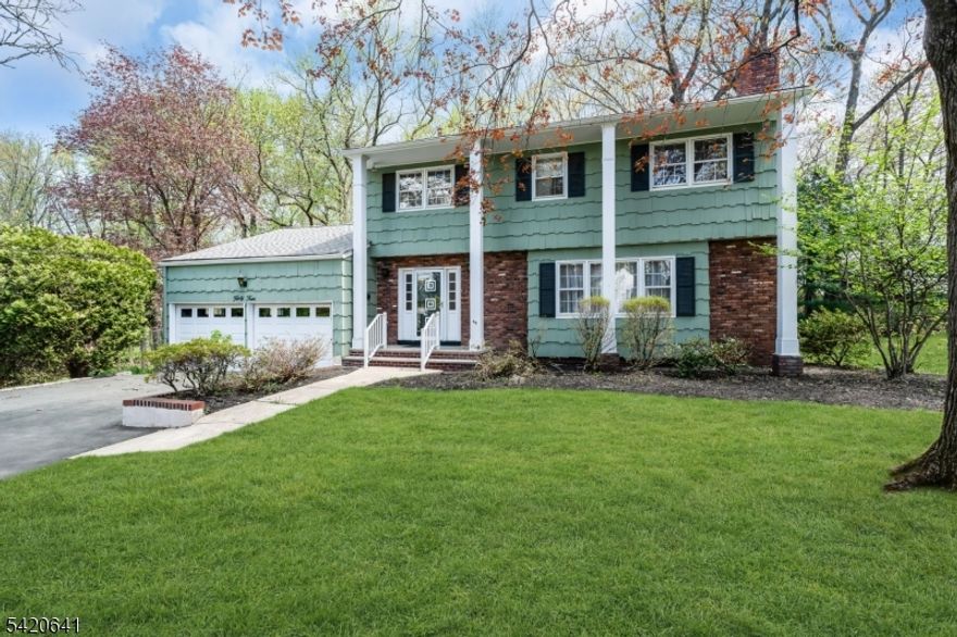 Don't miss the rare chance to own a meticulously maintained 4-bedroom, 2.1-bathroom home nestled on a quiet, serene street in the highly sought-after Westfield community. This warm and inviting home offers the perfect blank canvas, combining "great bones" with an unparalleled location. Step inside to a bright and spacious floor plan designed for comfortable living and easy entertaining. The heart of the home opens up to a truly breathtaking outdoor retreat an expansive, oversized backyard that backs directly onto the lush greenery of Lenape Park. Whether you are relaxing on the deck or enjoying the tranquil pond and walking paths just steps from your door, the peaceful views are second to none.