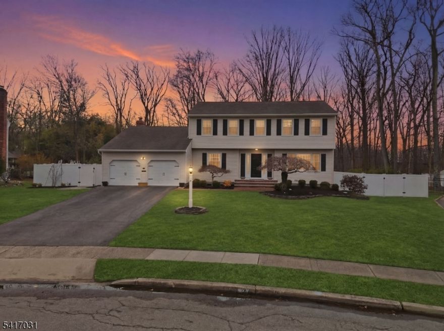Well-maintained Colonial located in the desirable Packanack Lake community, offering a comfortable layout and great space both inside and out. The first floor features a bright living room, formal dining room and a large eat-in kitchen with granite countertops, center island, and sliders leading to the deck. Just off the kitchen is a spacious family room with a gas fireplace and a second set of sliding doors that open to the backyard. The backyard offers plenty of space for entertaining or relaxing and includes a wood-burning fire pit. Upstairs you'll find a large primary bedroom with a walk-in closet and a full bath featuring a soaking tub, double vanity, and separate shower. The second bedroom includes its own full bath, and a third bedroom completes the upper level. The finished basement provides flexible space for a playroom, home office, gym, or recreation area, along with a laundry room and a large storage room. Additional features include two newer HVAC systems, generator hookup, ring camera system monitoring entire property, Lutron smart switches throughout the house, and Cat6 Ethernet wiring throughout the home for improved WiFi coverage. Conveniently located close to Packanack Lake amenities, shopping, major highways, and NYC transportation.