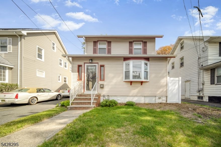 Welcome to this lovely 4-bedroom, 2.5 bath single family home in Hillside, NJ.  Just renovated, this home is turnkey, offering living on four floors.  The door opens to a light & bright Living Room, open to the Dining Room and leads to the updated Kitchen with plenty of cabinet space.  There is a half bath on the first level.  The stairs lead to the primary bedroom and two bedrooms. The Third level is the 4th bedroom or office.  The basement is a clean dry basement with washer and dryer.  Relax on the deck and the backyard is great for a barbecue.  No pets. No smoking is permitted in the home.  Home has central air and 4/1 car width driveway.  Verizon is available, if desired.  1 Year Lease. Don't miss this lovely rental.