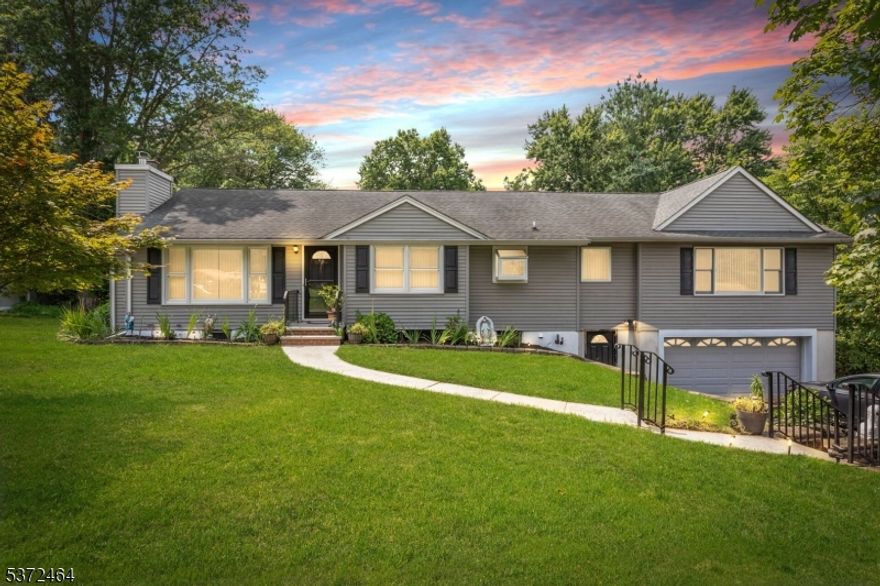 NOT in a flood zone! Spacious expanded ranch on 0.9 acres with 11 total rooms, including 5 bedrooms and 3.5 baths. Expanded in 2004, this home features a walkout basement with a full bath, wet bar, and access to both the backyard and garage perfect floorpan with so many other potential. The primary suite includes a private bath and sitting room. Galley-style kitchen with breakfast nook, plus a separate dining room. Heated and cooled 2.5-car garage. Two central AC units and both oil and gas heating systems provide year-round comfort. Attic with pull-down stairs offers extra storage. Freshly power-washed deck is ready for finishing. Large, flat backyard with light tree cover ideal for outdoor living. Conveniently located near shopping, dining, Wegmans, Home Depot, and Bridgewater Mall, with quick access to Route 22 and I-287!