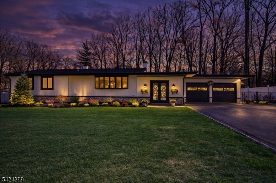 You really do have it all here! Style, scale & space. This sprawling ranch is set on an impressive level lot with privacy, presence & the kind of space buyers are always chasing. Plus, who doesn't love a ranch?! Inside, the home feels bright, open & effortlessly livable. Natural light pours through loads of windows, highlighting hardwood floors & generous room sizes throughout. The oversized living room offers a warm, welcoming feel, while the formal dining room with fireplace adds character & an entertaining focal point. The kitchen is a standout! Beautifully updated with quartz countertops, a large center island, vaulted ceilings, stainless steel appliances & abundant workspace. It opens naturally into the main living spaces, creating the flow today's buyers want. A comfortable family room with custom built-ins adds another inviting place to gather, relax & unwind.Bedrooms are spacious & well-positioned, including a peaceful primary retreat. Updated baths add style & practicality, while the finished lower level provides exceptional bonus space for playroom, recreation, gym, office, media room, or guests. Outside, the huge fenced yard offers endless possibilities for entertaining, play, gardens or simply enjoying the open space. The Parsippany-Troy Hills lifestyle blends top-rated schools with exceptional convenience, offering locals a variety of retail stores, dining, parks, nearby NYC transit, quick access to major highways and so much more!