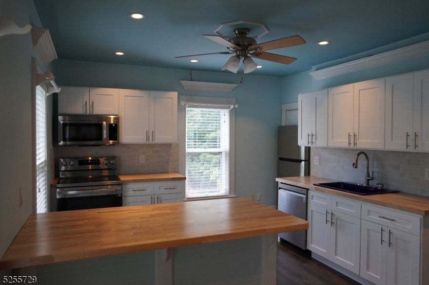 Pristine second-floor spacious and light-renovated unit with 2 bedrooms and 2 full baths! This is a must-see. Lots of parking and covered outdoor space. Trash pickup included, heat is split with first floor tenant. Electricity and water are the tenant's responsibility. Available 02/01/2026. By appointment only.