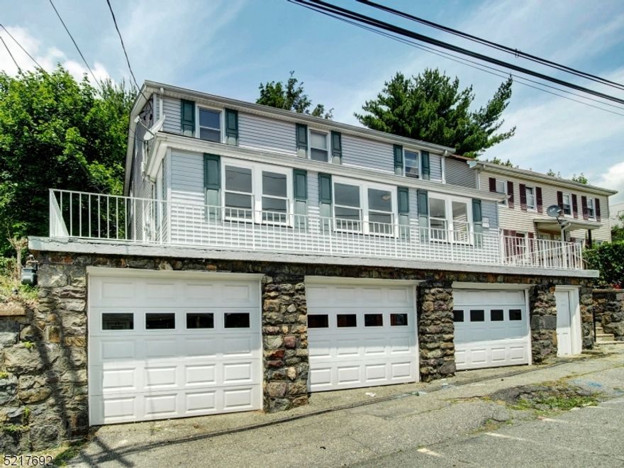 TERRIFIC INVESTMENT OPPORTUNITY. FIRST FLOOR HAS BEEN COMPLETELY REFRESHED WITH NEW COAT OF PAINT & NEW CARPET. SOME NEW WINDOWS. LIVE IN ONE UNIT AND COLLECT RENT FROM SECOND FLOOR. THIS SPACIOUS TWO FAMILY HOME IS LOCATED CLOSE TO MAIN STREET IN BOONTON , CONVENIENT TO SHOPPING, RESTAURANTS, SALONS, TRAIN STATION, ETC. 1ST FLOOR FEATURES A FINISHED WRAP-AROUND PORCH WHICH ADDS VALUABLE LIVING SPACE,  EAT IN KITCHEN HAS A WALK IN PANTRY & FRESHLY PAINTED CABINETS GIVE A GREAT CONTRAST & COMPLIMENTS THE KITCHEN. THE LIVING ROOM IS SPACIOUS AND HAS NEW CARPET AND LEADS TO A BONUS ROOM THAT CAN BE USED AS HOME OFFICE, PLAY ROOM, EXERCISE ROOM, EXTRA STORAGE, ETC. 2 BEDROOMS & 2 FULL BATHS...PRIMARY HAS ITS OWN FULL BATH.  HUGE CLOSETS ARE A PLUS. . 2ND FLOOR IS CURRENTLY RENTED MONTH TO MONTH AND FEATURES LIVING/DINING ROOM COMBO, KITCHEN, BEDROOM & FULL BATH. 3-CAR GARAGE / DRIVEWAY. FULL BASEMENT HAS WASHER & DRYER (OWNED BY TENANT) AND HOOK UP FOR A SECOND SET.  SEPARATED ELECTRIC & GAS  LARGE BACKYARD. TENANT HAS USE OF FIRST GARAGE TO THE LEFT. - WATER AND SEWER IS PRESENTLY SPLIT 1/3 TOP FLOOR 2/3 BOTTOM FLOOR  LAWN MAINTENANCE &  SNOW HANDLED BY TENANT. PUBLIC UTILITIES. A MUST SEE