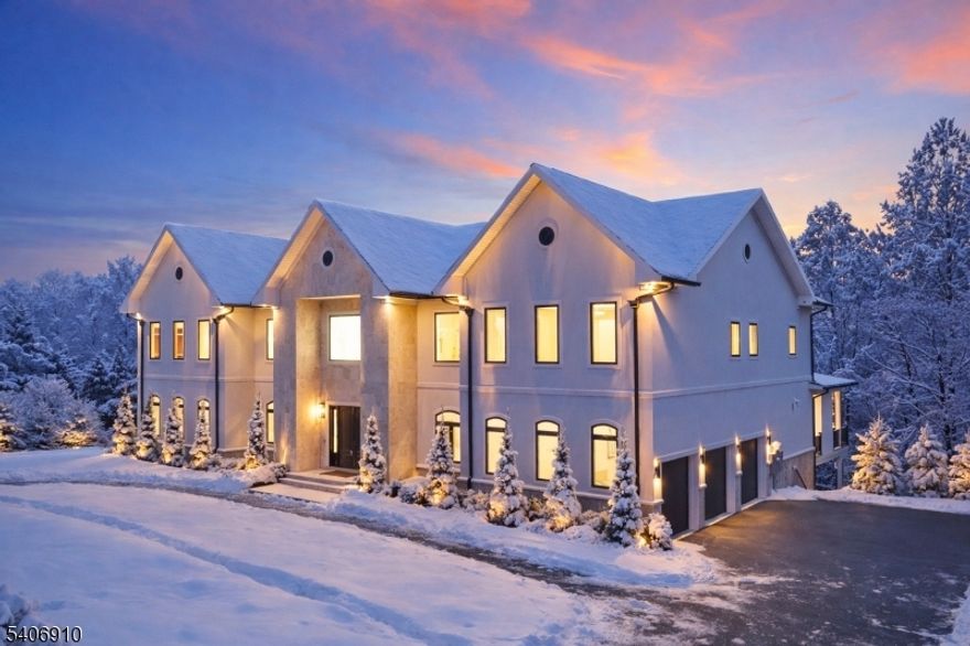 Welcome to this stunning, brand-new built 39 Westmount Drive, a rare offering that combines architectural elegance with modern luxury in one of Livingston's Bel Air, most coveted neighborhoods. This is not simply a home; it is a statement of lifestyle, success, and timeless taste. Sun-filled living level with oversized windows, high ceilings, two-way 22'FT fireplace. A chef-driven kitchen with Sub Zero, Dacor, Wolf appliances, dual dishwashers & statement lighting throughout. Every detail has been meticulously curated to the highest standard, from bespoke finishes to thoughtfully designed living spaces that strike a balance between sophistication and warmth. Expansive formal rooms flow effortlessly into inviting gathering areas. 7 en suite bedrooms provide comfort and privacy, and a luxurious primary suite is a true retreat with heated bathroom floors & spa-inspired finishes. Maple wood custom closets, smart home technology, cameras & endless refined finishes at every turn. A versatile lower level complete with media room, wet bar, bedroom & gym. Outdoors, sweeping views, a rooftop deck with a fireplace, the property becomes a private sanctuary, ideal for entertaining, peaceful mornings, and unforgettable moments. Proximity to fine dining, shopping, houses of worship, major highways & easy access to NYC. This home delivers the rare combination of prestige, privacy, and convenience. 39 Westmount Dr is more than an address - it is an opportunity to elevate your life.