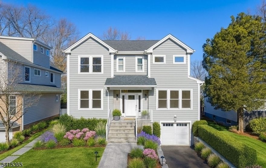 Sixteen Stephen Street is an exceptional new-construction residence offering 3,650 sf. of modern luxury in one of the town's most sought-after neighborhoods. This 4-bedroom, 4 full and 2 half bath home is designed for both grand entertaining and effortless everyday living. The sun-filled open-concept living room and dining room offer high ceilings, designer lighting, and sophisticated finishes throughout. The stunning custom chef's kitchen features Taj Mahal quartz countertops, premium appliances, an oversized island, and handcrafted cabinetry. This dream kitchen is the true heart of the home and is open to the family room, with fireplace and wet bar.  Step outside to your private resort-style oasis with a heated saltwater in-ground pool, built-in fire pit, and expansive patios ideal for year-round enjoyment. The serene primary suite includes a spa-inspired bath and a fitted walk-in closet.  In total there are four bedrooms, each with an en suite full bathroom and large walk-in closet.  Highlights include a first-floor guest suite, an office/den, a third floor family room and sitting room.  The walk-out 1,000 sf lower level has a powder room, a game room, a recreation room and access to the attached garage. All of this includes meticulously selected materials throughout. Ideally located close to Montclair's vibrant downtown, NYC transportation, parks, and top-rated schools. A rare opportunity to own a beautifully crafted, turnkey NEW luxury home in the heart of Montclair.