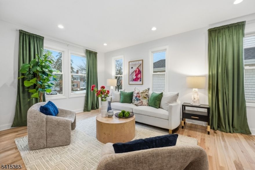 Sixteen Stephen Street is an exceptional new-construction residence offering 3,650 sf. of modern luxury in one of the town's most sought-after neighborhoods. This 4-bedroom, 4 full and 2 half bath home is designed for both grand entertaining and effortless everyday living. The sun-filled open-concept living room and dining room offer high ceilings, designer lighting, and sophisticated finishes throughout. The stunning custom chef's kitchen features Taj Mahal quartz countertops, premium appliances, an oversized island, and handcrafted cabinetry. This dream kitchen is the true heart of the home and is open to the family room, with fireplace and wet bar.  Step outside to your private resort-style oasis with a heated saltwater in-ground pool, built-in fire pit, and expansive patios ideal for year-round enjoyment. The serene primary suite includes a spa-inspired bath and a fitted walk-in closet.  In total there are four bedrooms, each with an en suite full bathroom and large walk-in closet.  Highlights include a first-floor guest suite, an office/den, a third floor family room and sitting room.  The walk-out 1,000 sf lower level has a powder room, a game room, a recreation room and access to the attached garage. All of this includes meticulously selected materials throughout. Ideally located close to Montclair's vibrant downtown, NYC transportation, parks, and top-rated schools. A rare opportunity to own a beautifully crafted, turnkey NEW luxury home in the heart of Montclair.