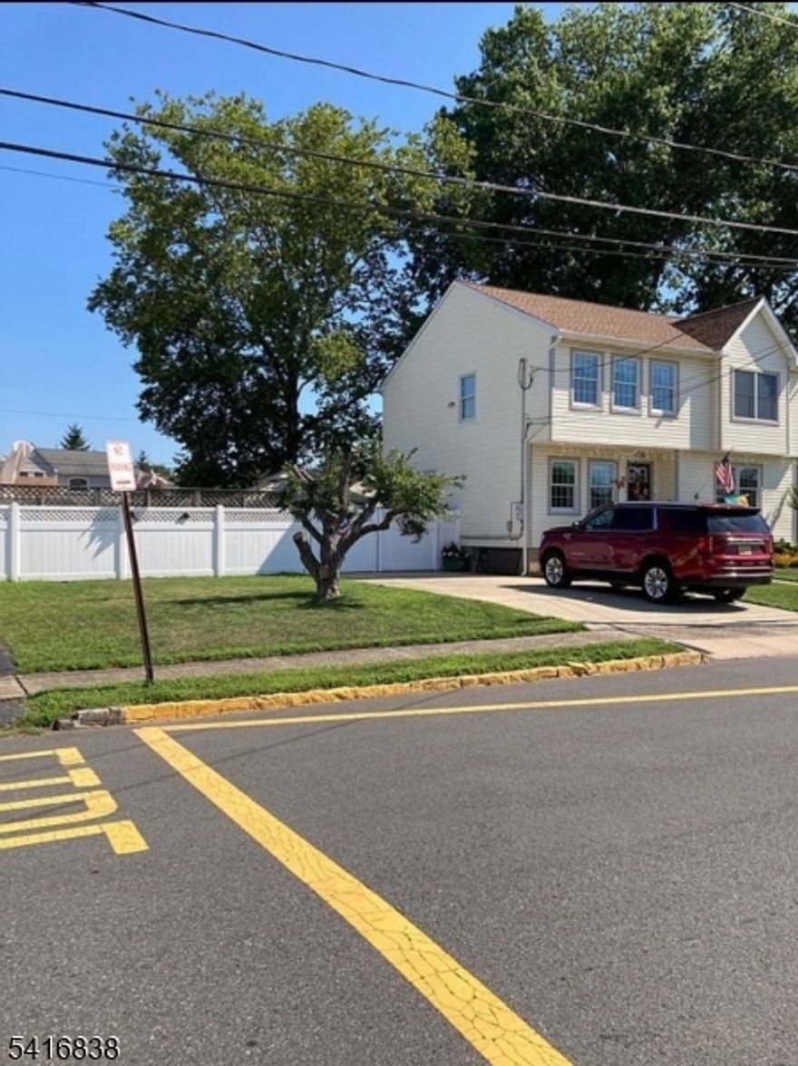 Welcome to this beautifully maintained Colonial set on a rare double lot in Hopelawn, offering space, comfort, and thoughtful updates throughout. This 3-bedroom, 2.5-bath home features 1,834 sq ft of living space with hardwood floors, recessed lighting, and an open layout ideal for everyday living and entertaining. The updated kitchen (2020) offers custom cabinetry, granite countertops, modern appliances, and under-cabinet lighting, flowing into the dining and living areas. The primary suite includes a private en-suite bath, spacious dressing-room style closet, and an additional double closet. A partially finished basement provides flexible bonus space with an additional shower and toilet. Enjoy the private backyard with a custom patio, pool, fenced yard, and multiple storage sheds, plus ample parking with a 4-car driveway and additional rear parking. Major updates include central A/C (2018), new roof and gutters with gutter guards (2024), gas baseboard heating with three zones, public water and sewer, and a full attic with pull-down stairs for additional storage. A move-in-ready home offering both indoor comfort and outdoor space in a convenient Hopelawn location.