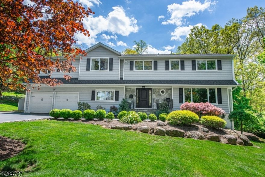 PRESTIGIOUS RIKER HILL Center-Hall COLONIAL with PERFECT Layout! BOASTING Over 4000+ Sq ft of LIVING space including Finished basement and sits on 1/2 Acre of LUSH Property.