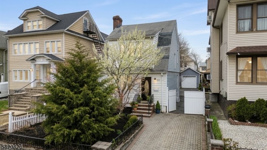 Welcome to 923-925 Kilsyth Rd! This is your opportunity to own a home in the highly desirable North Elizabeth area. Conveniently located just one block from the New York bus stop and only 3 minutes from the train station, this home is perfect for commuters. If you're looking for space and comfort, this is the one! Featuring 3 bedrooms, a formal dining room, a dedicated office space, and a spacious living room with a gas fireplace. The home offers 2 full bathrooms and a fully finished basement with a summer kitchen and separate entrance,  .Additional highlights include a detached garage, a long driveway that fits up to 5 cars, and a large deck ideal for entertaining.A must-see to truly appreciate everything this home has to offer!