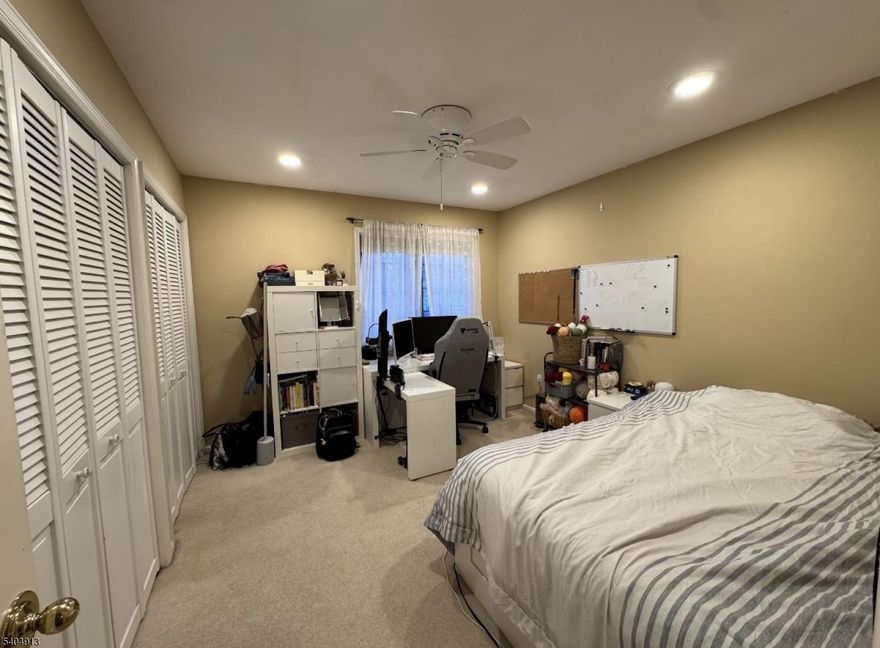 THIS LOVELY TOWNHOUSE offers a perfect blend of space and comfort. Features include spacious 3-4 bedrooms, a large eat-in kitchen, oversized family room, and a living room with a cozy fireplace. Enjoy formal dining, sliders leading to a private deck, and a versatile finished basement.