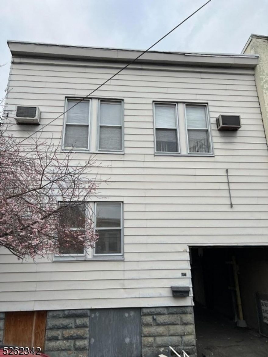 Look no further for your next home or investment property! This 2 family property in Bloomfield has a 1 bed/1 bath unit on the first floor, 2 bed/1 bath unit on the second floor, and a detached 2 car garage.  Gross rental income is $56,400 with a 6.7% cap rate.   You could also live in one apartment and use the other for rental income.  There are separate gas and electric meters for the apartments.  The heat/hot water are shared with separate thermostats (2nd floor pays) and the landlord pays the water bill.  The basement has a shared washer/dryer and all utilities.  The two car detached garage is approximately 550 ft with high ceilings and includes usage of the 1/2 bath in the basement.  Schedule your private tour today before it's too late!