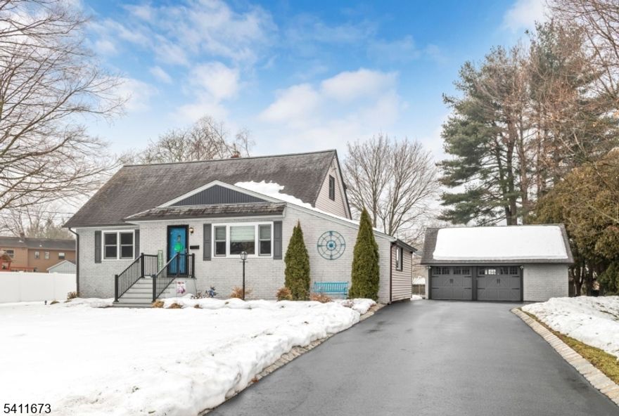 Welcome home to this beautifully maintained 1,932 sq. ft. Cape Cod offering the perfect  blend of classic charm and modern updates.  With 4 spacious bedrooms and 2 fully renovated bathrooms, this home provides both comfort and functionality for today's lifestyle.  The newly renovated kitchen features stylish finishes and thoughtful updates, making it a welcoming space for cooking and gathering.  Just off the kitchen, you'll find a versatile dining room that can easily double as a family room, giving you flexible living space to suit your needs.  Outside enjoy your newer deck, enjoy a level yard--perfect for entertaining, gardening, or simply relaxing.  The oversized two-car+ garage offers incredible storage and is ideal for car enthusiasts, hobbyists or anyone in need of a workshop space.  Conveniently located close to the town park and county golf course, you'll love the easy access to recreation, outdoor activities, and community events.  This move-in Cape combines character, updates and fantastic location--don't miss your opportunity to make it yours!