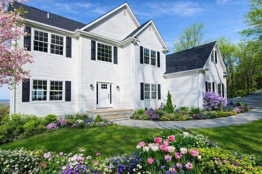 New Construction!  Perched to capture magnificent, wide-open views, this exceptional custom- built home blends elevated design with effortless comfort. Every detail has been thoughtfully curated to impress while still feeling warm and livable. The main level features gleaming hardwood floors, high-end finishes, and a seamless flow ideal for everyday living. The chef -inspired kitchen shines with quartz countertops and premium materials, opening to a huge great room with gas fireplace and a deck-the perfect spot to sip your morning coffee or host sunset gatherings with a view that never gets old. Also, the main floor offers a living -dining space and extra sitting room. The primary suite is a true retreat, generously sized with massive closets, additional bonus room and relaxing ensuite. The star of the show is on the lower level. This open huge space has four generous rooms. You can have an exercise room, entertain large gatherings or just enjoy a breath of fresh air. This amazing space opens to a massive outdoor space that has panoramic views of the mountains and sunsets. This property has over 5 acres which is extremely private. A rare combination of quality, construction, space and scenery!  Easy access to major highways and entertainment!  .