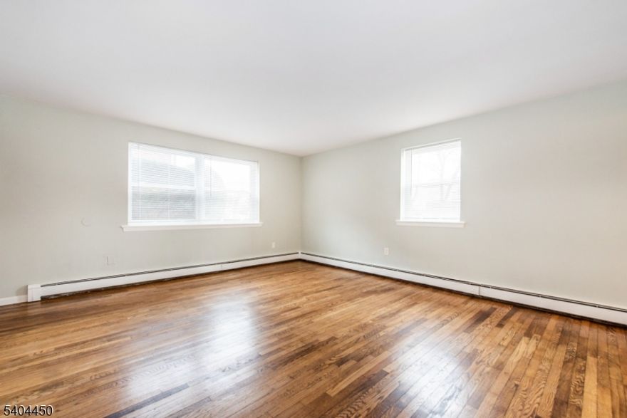 The rental you have been waiting for!!!  This unit offers a modern look and feel with its recently renovated interior. The kitchen boasts stainless steel appliances and updated countertops, while the bathroom has been updated with modern fixtures. For added convenience, the hardwood flooring throughout has been freshly painted and new tiles have been installed in the kitchen. Storage is also included and laundry facilities are conveniently located near the unit for added convenience.   Located near great restaurants, local shops, and grocery stores.  You will enjoy ample parking for yourself and guests as well.  Easy access to the bus.