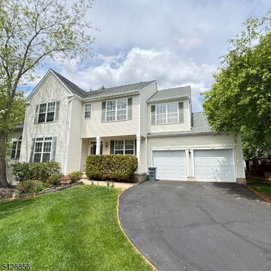 A beautiful "Madison" style house, with 4 bedrooms and 3.5 baths, is conveniently located within walking distance to Mt. Prospect elementary school and many other amenities. The house was upgraded with a newer designer kitchen, a newer designer bathroom on the 2nd floor, and newer carpet in the finished basement. The house boasts hardwood floors and high ceilings in the family room. The master bedroom has a walk-in closet, a large sitting area and a view over the wooded valley. The backyard is private, with a large deck facing deep woods. The walk out basement is finished with a bathroom and a lot of additional space. Basking Ridge is one of the top rated school districts in NJ.