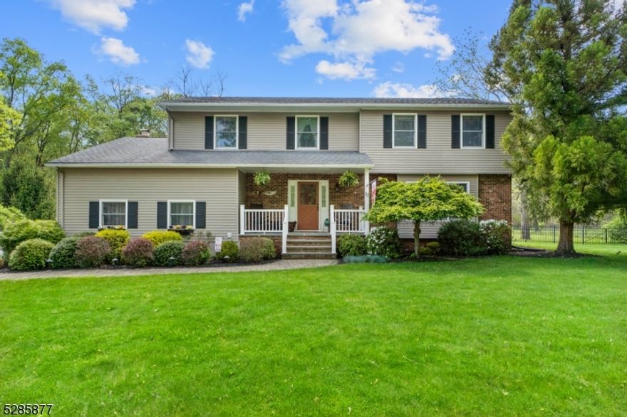 This is a rare opportunity to own in the desirable Walden Estates in Succasunna. Move-in ready 4 bedroom 2.1 bath colonial. The home welcomes you into a two story foyer with a staircase to the upper floor. To the right is a large living room with hardwood floors and lots of natural light. The spacious eat-in kitchen has sliding doors to the large deck. On one side of the kitchen is a separate formal dining room also with hardwood floors and on the other is the den with a wood-burning fireplace. The main level also offers a powder room, laundry room and access to the two-car built in garage. The upstairs has hardwood floors throughout.  There is a very private master bedroom with a large walk-in closet and an en-suite bathroom. Three additional bedrooms with great closet space and a full bath complete the level. The spacious multi-level deck has a built-in hot tub and a screened in gazebo. The large, fully fenced in backyard has a patio space with a chimenea and a newer shed with an outdoor potting bench. Walden Park (green acres) is located behind the property offering additional privacy. The large basement has high ceilings and is currently used as a workout space. It offers lots of additional storage and includes a workbench. With its great location and ample storage this home is move-in ready and not to be missed.