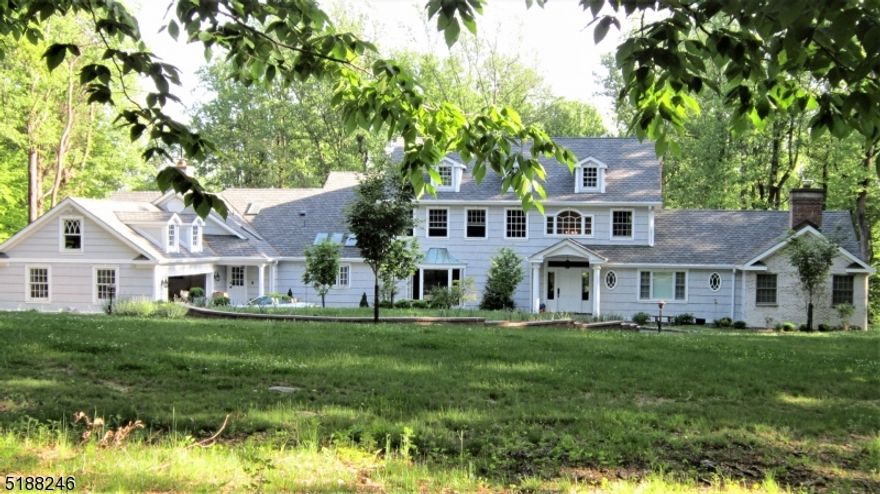 Quiet country road in neighborhood w beautiful New England repro colonial.  Completely updated and renovated in 2018 with high end detail.  Indoor pool area w/sauna 46 x 24 for year around enjoyment and sliders to terrace for summer. 34 x 15 Designer kitchen with wine cooler, Wolfe oven, White Dolomite counters, large pantry and expansive eating area leading to French doors and private patio. FR is adjacent with FP and spacious LR with FP opp clerestory entry foyer.  A third FP graces the beautiful first floor Primary suite with soaking tub and shower and 2 walk-in closets. 2nd fl laundry room for 4 Brs and stairs to full attic. The upstairs floorplan provides for 2BR sharing a bath at one end, one ensuite in the middle and one used as an office or BR over the pool mechanical area  There is also a 2nd level storage room for luggage.  Newer roof, 6 BR septic (2017) .  Full rear mudroom with outside entrance and garage entry/back stairs.  The acreage is tiered out the back with 2 levels and plenty of room for a great BBQ Sunday... low low low electric bills with owned solar panels very unobtrusively located. Squ ft does not include pool area which would yield 6800 squ ft.  Listing is as per town info..