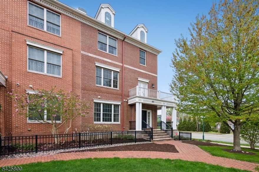 LIVE IN THE HEART OF TOWN, WHERE CONVENIENCE MEETS COMFORT! Don't Miss This Stunning 4-Bedroom End-Unit Townhome Located In Sought-After Livingston Town Center Offering The Perfect Blend Of Space, Style, And Convenience. Enter Through A Spacious Foyer To A FLEXIBLE FIRST-FLOOR SUITE WITH FULL BATH, IDEAL AS A GUEST ROOM, HOME OFFICE, OR STUDY. The Fully Finished Basement Adds Space For A Recreation Room And Includes A Powder Room, Just A Few Steps Up To Direct Access From The Oversized 2-Car Garage.The Main Level Is Designed For Everyday Living And Entertaining, Featuring High Ceilings, Open Floor Plan, And A Gas Fireplace In The Family Room. The Gourmet Kitchen Features Center Island, Granite Countertops, And Seamless Flow Into The Living & Dining Areas. STEP OUTSIDE TO ENJOY TWO WRAPAROUND PORCHES, Including One Directly Off The Living Area  Perfect For Morning Coffee Or To Relax. A Second Powder Room Completes Main Level. Second Level Features A Spacious Primary Suite With Walk-In Closet, Soaking Tub, And Separate Stall Shower. Two Additional Bedrooms, A Full Bath, And Convenient Laundry Room Complete The Upper Floor. Prime Location Near Shopping, Restaurants, Top Rated Schools, Parks, And Major Commuting Routes, Newark International Airport And St Barnabas Medical Center. FABULOUS AMENITIES INCLUDE ROOFTOP INDOOR POOL, GYM, GAME ROOM, BUSINESS CENTER, PARTY ROOM. 20 MILES TO NYC! Includes Tesla Charger,Water Softener-Owned, Freshly Painted.