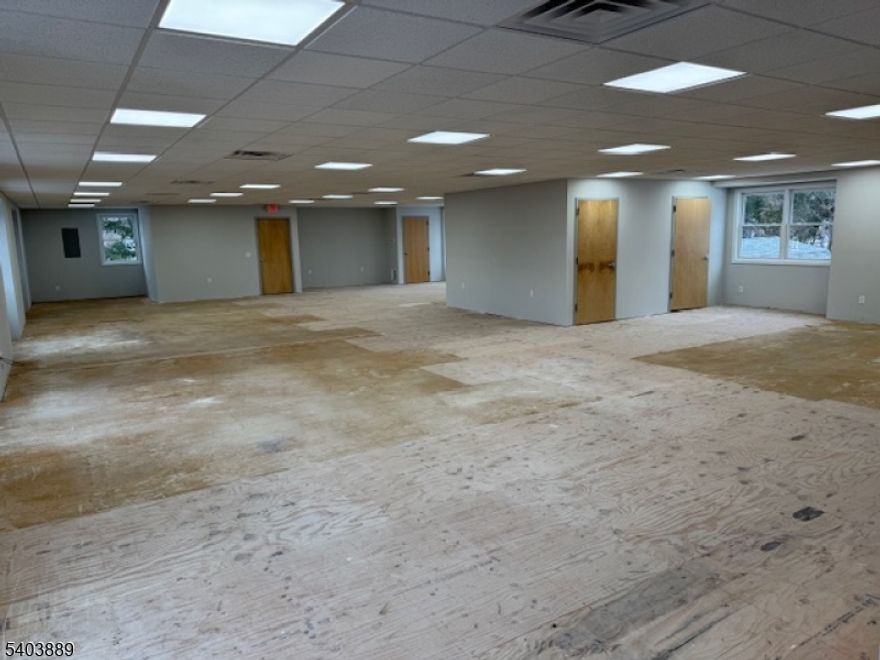 Highway Location!!  Newly renovated second floor location  Open space of  2920'.   Unit can be divided into 2 equal units of 1460'. 2 renovated rest rooms and 2 mud sinks.  Time to pick out flooring.  2 separate heating/cooling units for each side.   No CAM charges!!