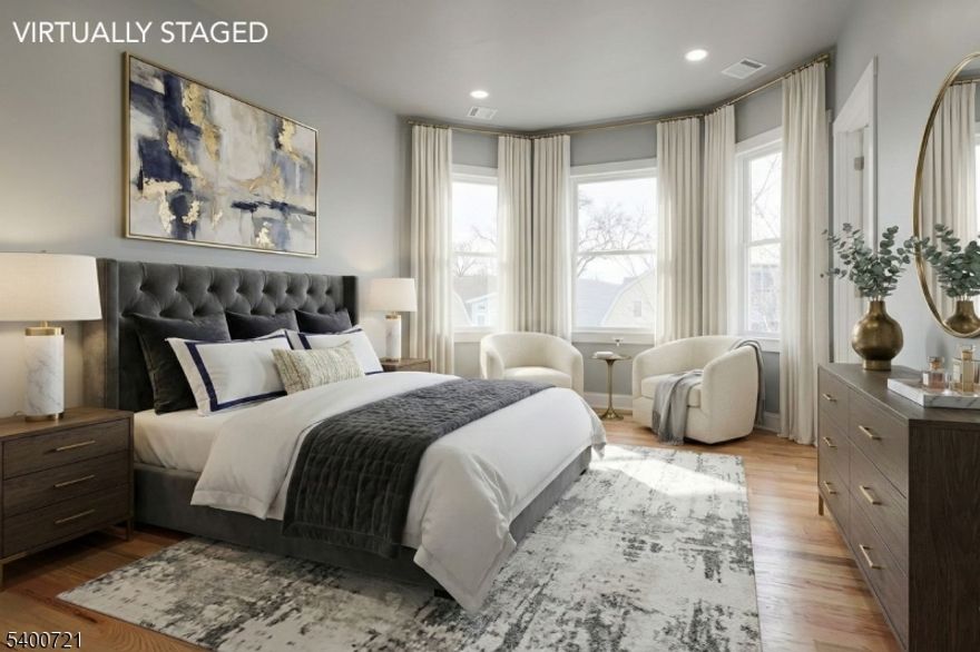 Welcome to this bright and beautifully updated 3-bedroom, 2-bathroom apartment in the Upper Clinton Hill section of Newark?s South Ward. This top-floor home features a stylish renovation and a layout designed for comfort, convenience, and modern everyday living. Natural light fills the spacious living room, highlighting the hardwood floors and recessed lighting. The updated kitchen offers Shaker-style cabinetry, quartz-style countertops, stainless steel appliances, and ample workspace for cooking and entertaining. The primary bedroom includes its own private en-suite bathroom with modern fixtures, creating a comfortable and private retreat. Two additional bedrooms provide generous closet space and flexible layout options to suit a variety of needs. The second full bathroom has been completely renovated. Additional highlights include updated flooring, clean finishes throughout, and generous storage. An exclusive laundry hookup with dedicated storage space is available for this unit in the basement. Conveniently located near Clinton Avenue, the property offers easy access to parks, shopping, major commuter routes, including I-78 and the Garden State Parkway, Newark Liberty International Airport, and NJ Transit for straightforward commuting to NYC. Beth Israel Hospital is just minutes away.