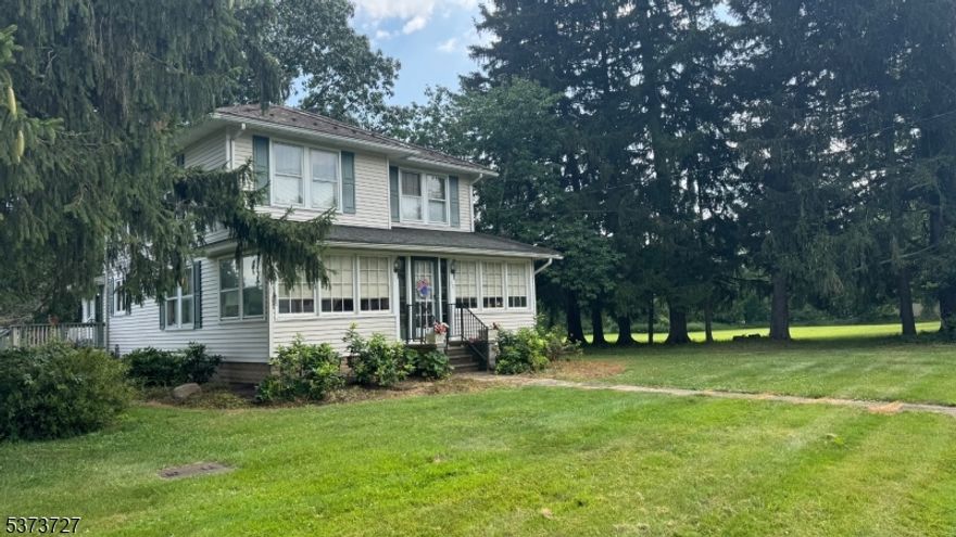 Welcome to this beautifully maintained and fully furnished 3-bedroom, 2 full bath home offering spacious, light-filled rooms and timeless charm. Hardwood floors enhance both levels, with generous living spaces throughout. The formal Dining Room includes a table and seating for six. The fully equipped Kitchen comes stocked with cookware, dishes, and utensils. The cozy Family Room features comfortable seating and a TV, perfect for relaxing evenings.The sunny screened-in front porch doubles as a cheerful home office with furniture included. The Breakfast Room offers a washer and dryer tucked neatly behind bifold doors. Tenant has access to a portion of the basement for storage, offering added convenience. Enjoy the peace and privacy of the expansive deck with multiple seating areas, surrounded by mountain views and lush green fields. While the garage is not included, the property offers ample parking. Located close to parks, shopping, and major highways, this home blends tranquility with accessibility. Prefer to bring your own furnishings? They can be removed upon request. Lawn care is handled by the owner, so all you need to do is move in and enjoy.