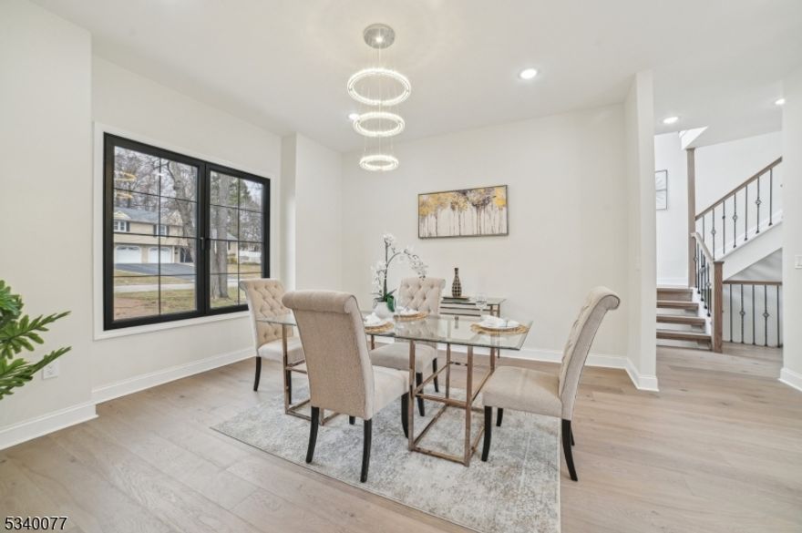 Ready to move in - New Construction with 10 Years of Builder Warranty. Walk into this stunning custom with details to each aspect of the home. The modern house in a quiet neighborhood in Florham park. Home features a stunning grand kitchen with a scullery behind to keep the clutter out. A semi-enclosed secondary living space that opens onto an large deck. This versatile outdoor haven allows homeowners to enjoy the outdoor year-round. The design conversations for this new home focused on creating a floor plan that is perfect for living and entertainment. Designing a home around spaces that foster celebrations and memory-making is what home should be all about. Large driveway with side car garage with stone paved sidewalk and beautifully curved and ruffled Belgium block brings a welcoming charm. In ground sprinklers and EV outlet. Short Walk to NYC commute, shops, golf course etc.