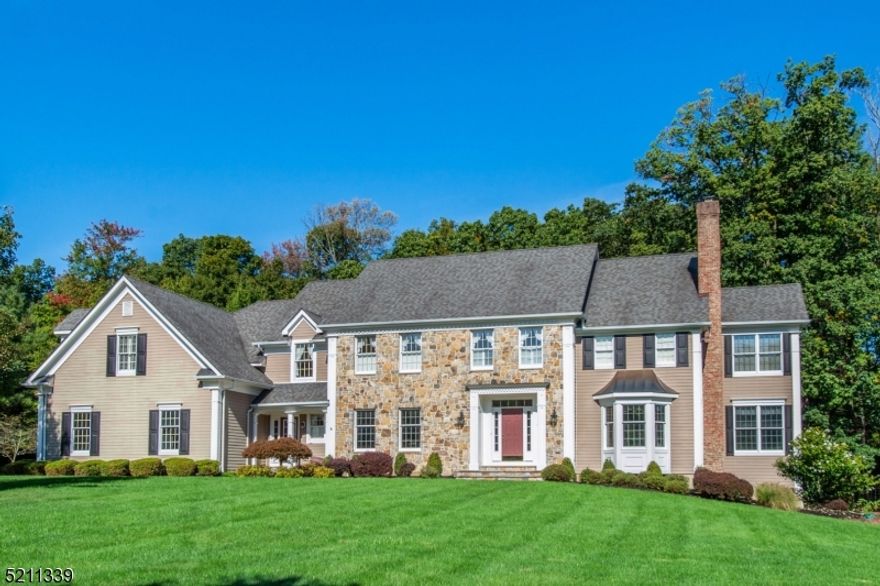 This fabulous Bocina-built Bucks County Colonial has a prime location on 4+ acres at the end of a private cul-de-sac. With an open, bright and airy floor plan, the first level features a spacious kitchen which opens to a family room with gorgeous stone fireplace, formal dining room & butler's pantry, living room with fireplace, office with built-ins and sunroom.  The second level features 5 bedrooms including an expansive master suite with sitting room/nursery, spacious bath,  two walk-in closets and an additional office.  A daylight lower level includes a gym, recreation spaces and full bath.  The amazing private yard boasts a lovely pool and plentiful spaces for recreation.  Square footage according to township records - 5,705 in living area, 2,483 in lower level and 1,738 is finished.