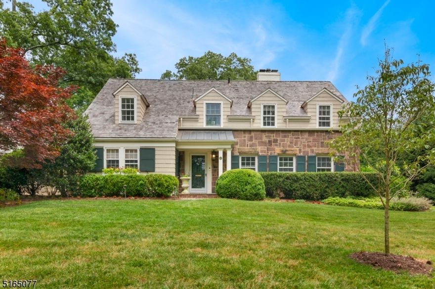 Located in the most COVETED neighborhood and PICTURESQUE street in PRESTIGIOUS OLD SHORT HILLS! MOVE RIGHT INTO this STUNNING Center Hall Colonial GEM which is architecturally designed for both INDOOR and OUTDOOR living, which flow seamlessly together. The welcoming Foyer guides you past the ELEGANT Living/Billiard and Dining Rooms into the Gourmet Chef's Kitchen with inset cabinetry and stainless steel appliances, Breakfast Room and Pantry which are open to the WARM and INVITING Family Room w/ built ins and wood burning Fireplace. The distinguished paneled Office, Butler's Pantry, Powder Room and Mudroom complete the First Floor. Second floor boasts the GORGEOUS Primary Bedroom with Cathedral Ceiling, Gas Fireplace, Walk In Closets and new SPA Bathroom with large stall shower and separate soaking tub. 4 additional Bedrooms, 3 additional NEWLY RENOVATED Baths and Laundry Room complete the second floor. Finished Basement includes a paneled recreation Room and custom Wine Cellar! ENJOY morning coffee and celebrations on the SPECTACULAR Patio w/ Brick Fireplace and Outdoor TV overlooking the MANICURED flat PRIVATE backyard. Home includes a brand new cedar shingle roof, full house generator, Tesla charger and stereo surround. Ideal location within walking distance to trains, town, restaurants and scenic ponds. This home has it all! MUST SEE!