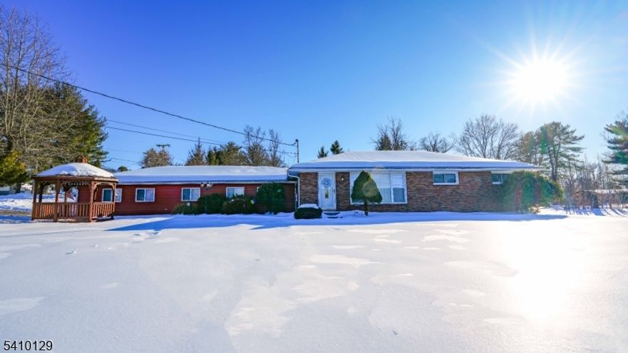 Come check out this freshly painted, move-in ready ranch home located in the heart of Holland Township. This stunning home features a spacious family room with direct access to a large backyard and patio, perfect for enjoying summer days and nights. The upgraded kitchen boasts granite countertops and ample counter space, ideal for cooking and entertaining. The home also offers a separate dining room, a large living room (currently being used as a dining room), three nicely sized bedrooms, one full bath, one half bath, and a large basement with great potential. Recent upgrades include new doors, trim, baseboards, roof, sump pump, bathroom vent, electrical panel, water softener, air conditioning unit with all new ductwork, and solar panels (leased).