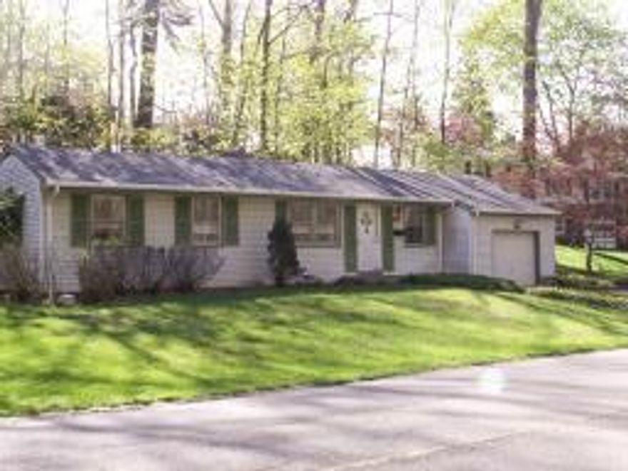 This Beautifully Maintained Home offers Stunning Lake Views of Lake Mohawk, combining both charm and functionality. Featuring 3 Spacious Bedrooms plus an office that can easily serve as a 4th bedroom. The updated bathrooms bring modern appeal, while the large kitchen, equipped with stainless steel appliances, is perfect for cooking and entertaining. The finished walkout basement adds even more living space, complete with a half bathroom and a laundry/storage area. A 2-car garage, along with an additional 2-car parking pad, ensures plenty of room for vehicles. The expansive deck is ideal for outdoor entertaining, offering serene lake views. Throughout the home, hardwood flooring adds warmth and elegance, and the large living room, with floor-to-ceiling picture windows, frames the breathtaking views of the lake, making it the perfect place to relax or gather with loved ones. This home is an exceptional blend of style, comfort, and convenience, situated in one of the area's most desirable locations.