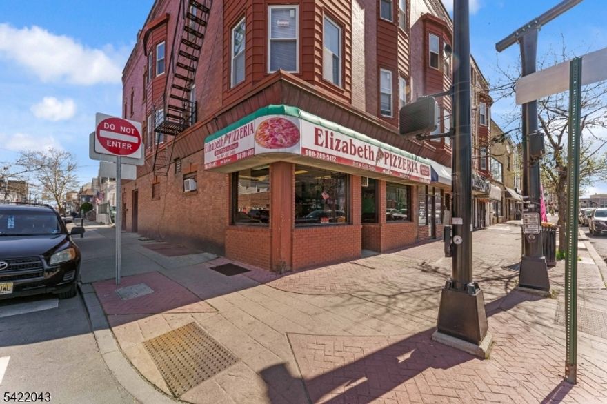 Opportunity for an owner-operator or investor looking to step into an established (turnkey) business in a busy and strategic location in the heart of Elizabeth. Restaurant/Pizzeria type, conveniently situated near business & major public transportation routes (1 & 9) and within close proximity to mayor offices of Elizabeth City Hall, (Police Department, Fire Department etc.). This business has been successfully operating for over 10 years and has built a loyal customer base in the community. The restaurant serves a variety of ethnic and American cuisine, including pizza, appealing to a broad range of customers. This turnkey operations include: 2 pizza ovens,  a 6-burner stove, fryer, grill, cold buffet stand, warmer stand, meat cutter machine, large dough/batter beater machine, large walk-in freezer,3 soda machines (owned by vendors), refrigerator, fixtures, etc. 5 Year Lease expiring end of 2030 for $3400/month - Utilities approx $600/month . Current seating capacity: 13 tables with 4 chairs each. Potential for improvement - could benefit from remodeling to maximize the layout and create additional seating capacity, providing an opportunity for the new owner to further grow the business.  Information on gross & net income will be available to willing & able buyers only.