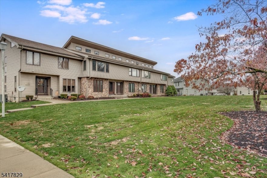 Multi-Level Townhouse in Desirable Rolling Hills that is Freshly Painted and Move In Ready. This townhouse offers an inviting open floor plan with new flooring throughout. The bright living room flows into an updated kitchen and dining area that opens to a private deck, ideal for relaxing or entertaining. Upstairs features two spacious bedrooms, including a primary suite with a walk-in closet and 3rd floor loft. The finished basement with built-in cabinetry provides excellent additional living and storage space.Enjoy community amenities such as basketball courts, a swimming pool, tennis courts, a soccer area, and a playground. Conveniently located near shopping, dining, and major routes. HOA includes water, trash, sewer, yard maintenance, and snow removal.