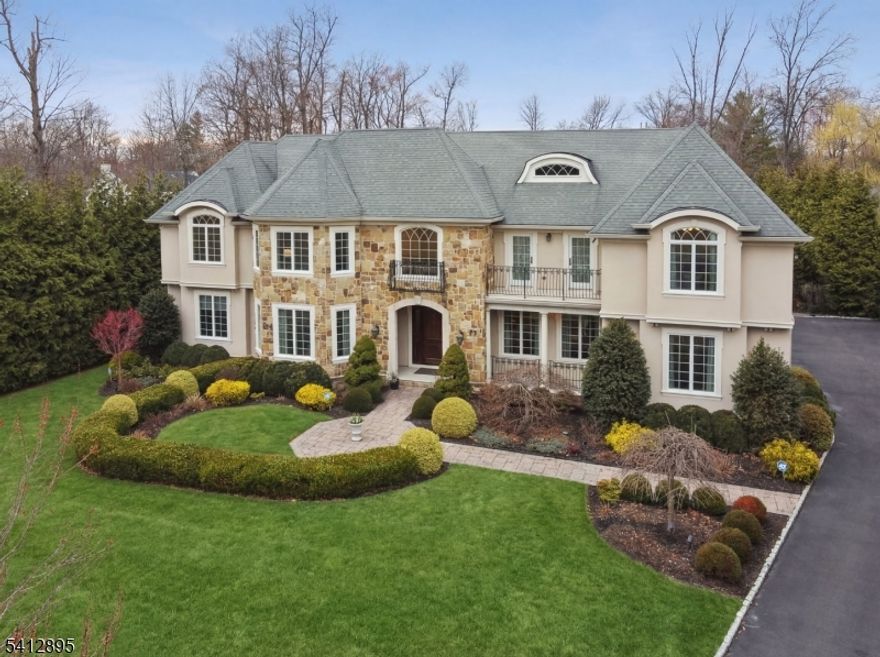 This is your Dream Home! 8,383 sq ft Center Hall Colonial Custom built for owners in 2013 is ideally located on totally level .67 acre lot on quiet street in highly rated Hartshorn Elementary School District. 7 bedrooms, 7 bathrooms (6 full baths and one powder room). Custom mahogany front door opens into a grand 2-story entrance hall with majestic staircase. Elegant dining room w/ custom moldings. Butler's pantry, stunning eat-in chef's kitchen w/ SubZero, Viking, & Bosch appliances, electric oven, granite countertop & oversized center island totally open to incredible family room w/ gas fireplace. Easy access from both the kitchen & family room to expansive patio & spectacular, level private backyard. Living Room w/ gas fireplace. Gracious 1st floor in-law suite w/ en-suite bath. Easy 1st floor access to oversized 3 car garage. Luxurious primary suite w/ 12' ceilings, gas fireplace, 2 huge custom walk-in closets & sitting room, & spa-like primary bath, jetted tub & steam shower. 3 more en suite bedrooms + another home office/bedroom & laundry on 2nd level. Beautifully finished lower level w/ walkout access, 9' ceilings, recreation room w/ large wet bar, movie theater w/ 96" screen, exercise room, large bedroom ste. Smart house features! Generac generator, large, level private backyard w/ expansive stone patio & basement access. Plenty of room for 20'x40' pool. Just 0.3 miles to Pingry School, 0.4 miles to Gero Park, & 0.8 miles to highly rated Hartshorn Elementary School!