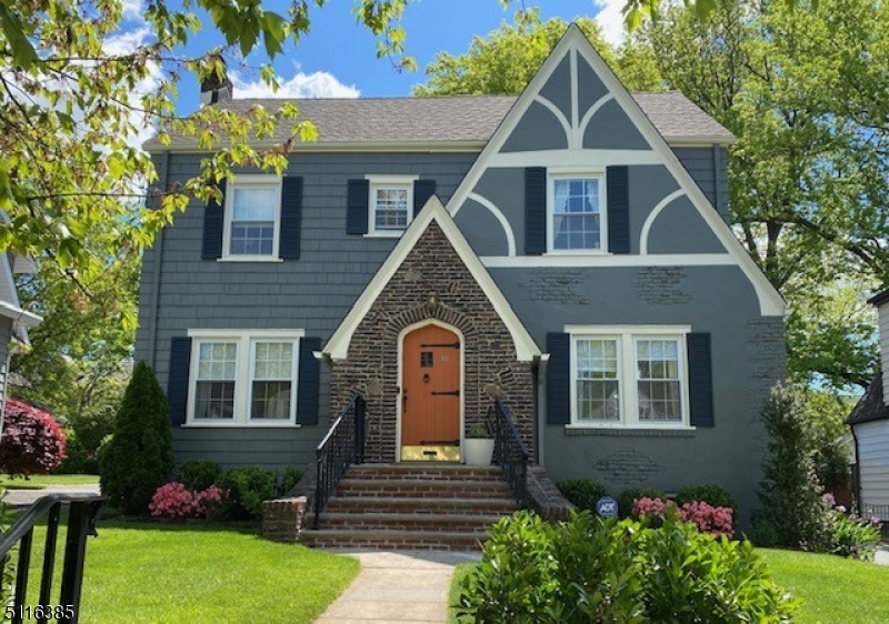 Welcome to this striking 4 bedroom 2.5 bath center hall Colonial/Tudor located in the sought after College Hill section of town. Terrific curb appeal, impeccable condition, renovated kitchen and bathrooms plus many upgrades throughout this stunning home, will certainly impress even the most discerning buyers. High ceilings, well portioned rooms, wonderful period details plus an abundance of sunlight set this home apart from the rest. Upon entering, the tone is set for your enjoyment....The first floor offers a large living room, stone fireplace, sun-filled den, spacious dining room, beautifully renovated kitchen, plus mud room and powder room. The second floor features 3 spacious bedrooms plus a fabulous hall bath with double vanity. The third floor primary suite has a fantastic marble bathroom with radiant floor heating, walk-in closet plus additional storage. The lower level rec room, laundry, utility & storage area complete this wonderful home. The large, fenced, flat yard, expansive stone patio, rear deck, phenomenal location and house makes this a jewel.  Jitney stop is 2 blocks away, plus close proximity to park, library, post office, town and restaurants.