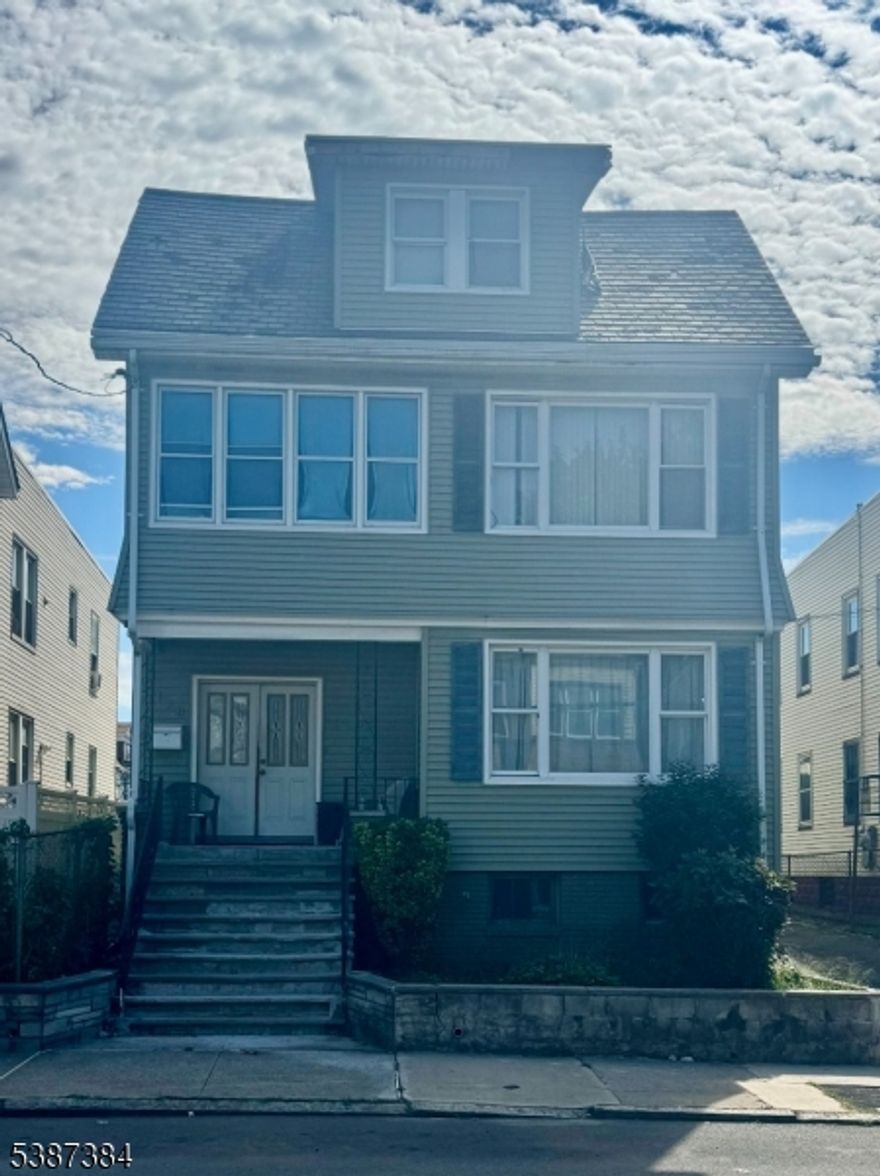 Spacious 2-family investment property located in the sought-after Weequahic neighborhood. The first-floor unit offers 2 generous bedrooms, a large living and dining area, an eat-in kitchen, and a full bathroom. The second-floor unit features 3 bedrooms, a second expansive living and dining area, an eat-in kitchen, and a full bathroom. Additional highlights include a large bonus room on the third floor and a full, unfinished basement. Conveniently close to local schools, public transit, shopping, and major highways. Property is being sold "AS-IS"  and is in need of TLC. Cash offers only. *** BOM - buyer unable to perform