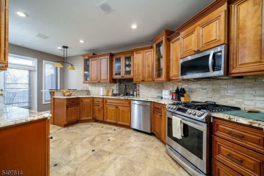 Rare Bedminster end-unit with a first-floor bedroom + full bath ? the flexible layout buyers struggle to find. Move-in ready, sun-filled end-unit in Timberbrooke with a layout that works for real life. With 3 bedrooms and 3 full baths, including a first-floor bedroom + full bath, this home offers rare flexibility for guests, a dedicated office, or an in-law suite. A welcoming entry with a curved staircase opens to separate living and dining rooms, an updated eat-in kitchen, and a spacious living room with a fireplace, ideal for entertaining or cozy nights in. Upstairs you'll find an oversized primary suite with a walk-in closet and a spa-like bath featuring dual sinks, a soaking tub, and a separate shower, plus an additional bedroom and full bath. Enjoy two Trex decks for easy outdoor living, updated flooring and finishes, wrought-iron spindles, an attached garage, and a private outdoor setting, all in a sought-after Bedminster community.