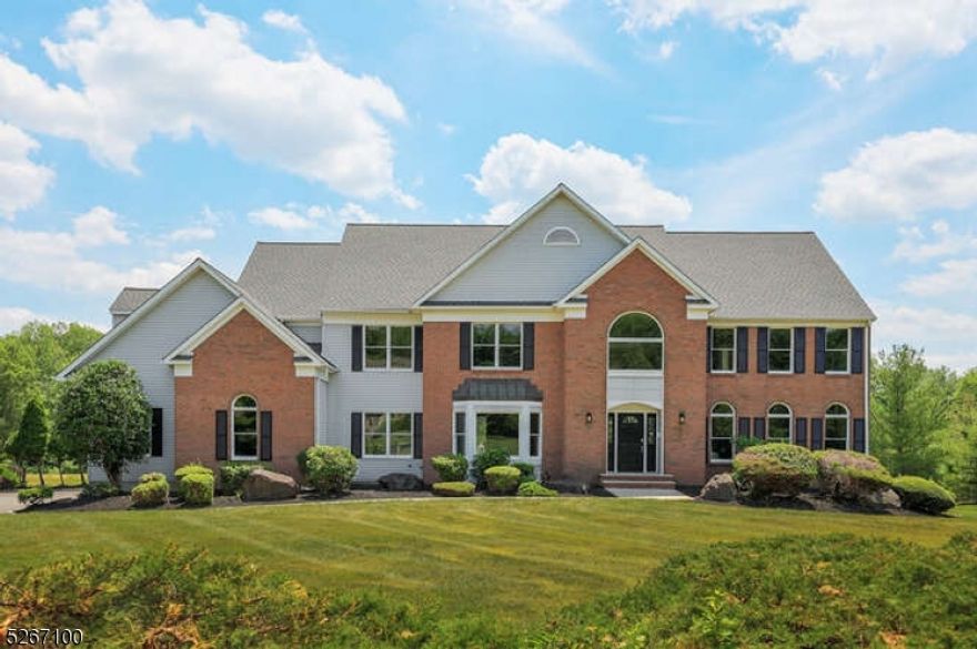 Move right in to this gracious newly updated (2024) 5BR, 3.2 BA Colonial. Set on a spacious and private 1.7-acre lot in a quiet neighborhood, ideal for biking, walking and exercising the dog! NEW beautifully updated kitchen features new cabinetry, quartz counters & center island breakfast bar, Brand NEW 48" Wolf gas oven/range w/ custom wood hood & Brand NEW Sub Zero refrigerator! Step outside thru the slider doors to the maintenance-free wood deck offering a perfect spot to enjoy the peaceful views of your backyard. Beautifully finished hardwood floors on both levels, creates a warm inviting atmosphere. Whether you choose to gather in the open concept family room with its charming wood-burning FPL, relax in the gracious sun-filled living room, or dine in the formal dining room w/ tray ceiling and bay window, every corner offers functional style and comfort for living! Convenient 1st floor office (could convert to a bedroom), w/ powder rm adjacent, 1st fl laundry w/ new W/D, 2nd powder rm and spacious 3 car garage. The 2nd fl features primary BR suite w/ newly updated full bath with modern tile and finishes & 2 large walk in closets + 3 add'l bedrooms, full bath & a bonus room/5th BR w/ full ensuite bath &back staircase. Expanded blacktop driveway ensures ample parking for you & your guests. Large open basement with lighting and painted floors offers great rec space, storage. Roof '22, HVAC '23, Water heater '23. Public water & sewer. 4,290 sq ft based on owner's appraisal.