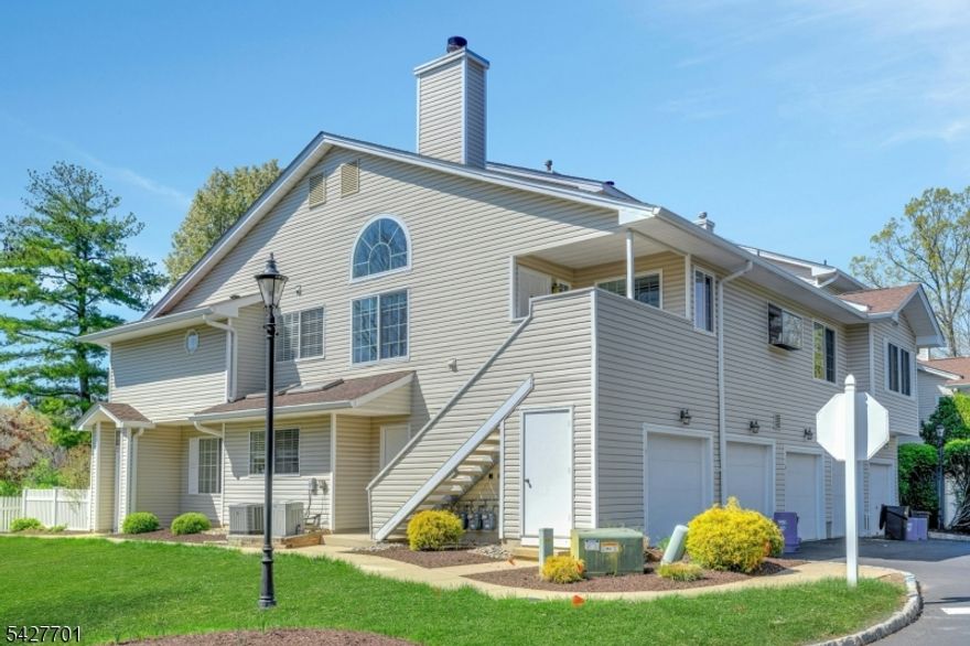 Bright and beautiful end-unit in the sought after Crestmont Highlands section of The Hills! Featuring a dramatic two-story living room with huge newer Pella windows, a cozy wood-burning fireplace, kitchen with charming garden window, and a dining area perfect for everyday living. The loft with skylight is perfect for a home office, den, or guest area. Hardwood floors on the main level add warmth and style. The primary bedroom offers a large walk-in closet, and bath with dual vanities. Hardwood floors enhance the main level, while the in-unit washer and dryer add practical convenience. A private porch offers space to relax outdoors, along with the added benefit of a 1-car garage. Ample guest parking nearby. Recent updates include new Pella windows (2024) and a newer water heater. Enjoy low Bedminster taxes and The Hills' outstanding amenities, including access to two pools, clubhouse, fitness center, tennis courts, playground, and scenic bike and walking paths. Conveniently located near parks, hiking trails, and fine dining, with easy access to Routes 206, 78, and 287. Bus and train service are also nearby for added convenience. Come see this warm & inviting move-in ready home!